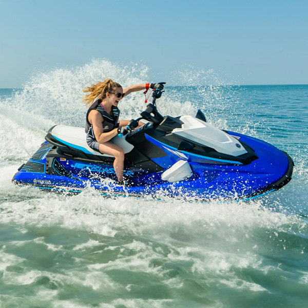 Woman shown enjoying the ride on a Yamaha JetBlaster shown on Lake Winnebago near Oshkosh, WI
